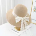 Women straw sun hat wide brim summer beach vacation woven hat with white lace bow ribbon - M (56-58cm) / JS32010 Khaki