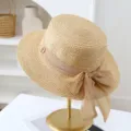 Chic women flat top straw sun hat with elegant bowknot ribbon summer beach vacation stylish - M (56-58cm) / JS80461-15 Khaki with Coffee Strap