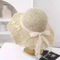 Sweet women straw sun hat lace ribbon bow large brim beach vacation summer UV protection. - M (56-58cm) / Small Bow Lace Bow Style - Beige