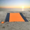 Waterproof outdoor beach mat and picnic blanket in orange and grey with pegs and pouch. - Orange with Double Gray