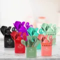 Colorful silicone kitchen utensil set with wooden handles and matching storage container. - Square Bucket with Utensil Holder / Random Color