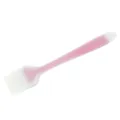 Large translucent silicone basting brush in pink, ideal for kitchen baking and grilling tasks. - Pink