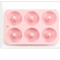Pink 6-cavity silicone donut mold for baking homemade cakes, pastries, and DIY sweet treats. - Pink