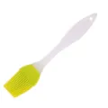 Silicone pastry brush with white handle and yellow bristles for baking and BBQ. - Green