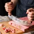 Stainless steel rocker knife with wooden handles for cutting nougat, snowflake crisp and pizza. - Standard Type