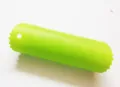 Green silicone garlic peeler tube kitchen tool with serrated ends and hanging hole. - Garlic Peeler (Green)