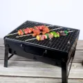 Grill barbecue au charbon pliable portable pour camping en plein air, fourneau compact. - Noir