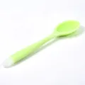 Green silicone kitchen spoon for cooking, flexible heat-resistant kitchen utensil variant item. - Translucent Green Solid Spoon