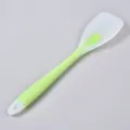 Translucent silicone cooking spatula with green handle, flexible kitchen utensil for baking. - Translucent Green Salad Spoon