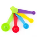 Colorful plastic measuring spoons set 5-piece baking tools with clear capacity markings. - 5-Piece Measuring Spoon