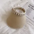 Straw sun visor for women, elegant pearl decorated empty top hat for beach vacation summer. - Single Row Large Beads (Beige)
