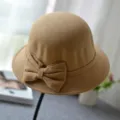 Close-up detail of the elegant camel felt dome hat featuring a stylish side bow design. - M (56-58cm) / Round Top Bow / Khaki