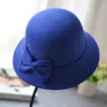 Detailed view of the elegant blue wool dome bow cloche hat, showcasing delicate bow detail. - M (56-58cm) / Round Top Bow / Sapphire Blue