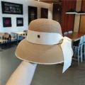 Chapeau de paille beige pour femme avec élégant nœud ruban blanc et détail métal M. - Taille Unique(54-59cm) / Kaki