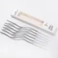 Silver wavy birthday candles set for cake decoration, elegant party celebration supplies. - Silver Wave Candles