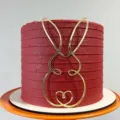 Detailed close-up of a stylish gold acrylic Easter bunny cake topper with heart tail on cake. - Cake Side Heart Tail Rabbit / Large Single Piece (Height about 11CM)