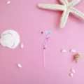 Pink acrylic number 7 cake topper with cute ocean seashell patterns for birthday party. - 7 / S