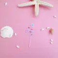 Pink acrylic number 4 cake topper detail with ocean seashell and starfish marine theme. - 4 / S