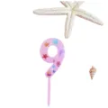 Detail view of the pink acrylic number 9 cake topper with cute ocean theme patterns. - 9 / L