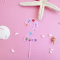 Pink acrylic number 2 cake topper with ocean marine themes like starfish and shells for birthday. - 2 / L