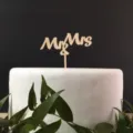 Wooden Mr and Mrs cake topper detail shot, elegant wedding and party dessert decoration. - Style 8