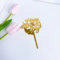 Gold acrylic Happy Mother's Day cake topper detail shot with pink tulip decoration. - Happy Mother's Day