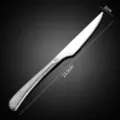Stainless steel steak knife with textured handle, elegant western tableware for dining table. - Steak Knife Only
