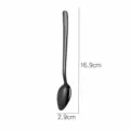 Black stainless steel baby fruit puree spoon with serrated edge, total length 16.9cm. - Black