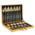 Stainless steel 24-piece cutlery set with gold finish and white handles in gift box detail view. - 24-Piece White and Gold Cutlery Gift Box Set