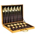 Detailed view of the 24-piece stainless steel cutlery set with gold finish and pink handles. - Pink & Gold 24-Piece Flatware Sets in Gift Box