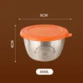 Roestvrijstalen sauskom met deksel, 80ml kleine kruidenbeker voor salade en dressings. - Oranje