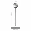 Stainless steel salad spoon with long handle and brushed finish, 29cm length for serving. - Salad Spoon / Silver