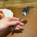 French 304 stainless steel spoon, creative tableware with elegant handle design for dining. - Tea Spoon