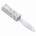 Portable lint roller for clothes with tearable sticky sheets and ergonomic white handle. - 30 Sheets / White