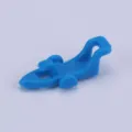 Blue plastic fishing hook keeper for lure rods. Durable tackle accessory for safe bait fixing. - Blue