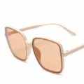 Gafas de sol cuadradas de moda con montura beige y lentes claras para mujeres con estilo. - Marco Beige Lentes Té Claro