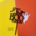 Halloween black acrylic cake topper with ghost and bat design, perfect for party desserts. - Ghost The Boo Crew