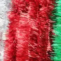 Christmas metallic tinsel garland detail view, shiny festive party hanging decoration. - 2M Red