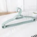 Plastic non-slip clothes hangers, multifunctional household adult clothes hangers in light green. - Blue