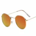 Classic metal round frame sunglasses with red reflective lenses for daily fashion wear. - Gold Frame Red Mirrored Lenses