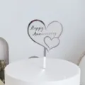 Silver mirror acrylic heart cake topper with Happy Anniversary text for wedding celebration. - Happy Anniversary / Silver