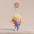 Simpatico portachiavi con bambola di peluche riccia, ciondolo soffice per borse e chiavi. - Giallo