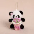 Cute plush panda keychain holding a knitted pink flower bouquet, soft toy backpack charm. - 12CM Piece / Pink