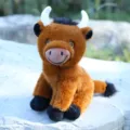 Lindo peluche de vaca de las Tierras Altas variante, animal suave marrón con cuernos. - Marrón