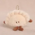 Adorable llavero de peluche con forma de empanadilla y pequeños pies con cadena. - Empanadilla