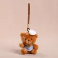 Joli pendentif en peluche ours marron avec toque de chef et bavoir pour sac accessoire - Ours