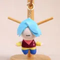 Cute plush keychain toy featuring bright blue hair and colorful outfit for bags and keys. - Boy Group Doll with Blue Hair and No Eyes