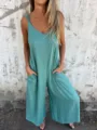Casual loose linen-blend jumpsuit detail featuring deep v-neck and deep side pockets. - S / Malachite green