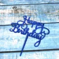 Blue acrylic Happy Birthday cake topper detail close-up, shiny party decorations. - Mirror Royal Blue