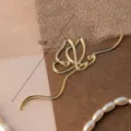 Gold acrylic abstract butterfly cake topper detail view, elegant party decoration accessory. - Acrylic Outline 1